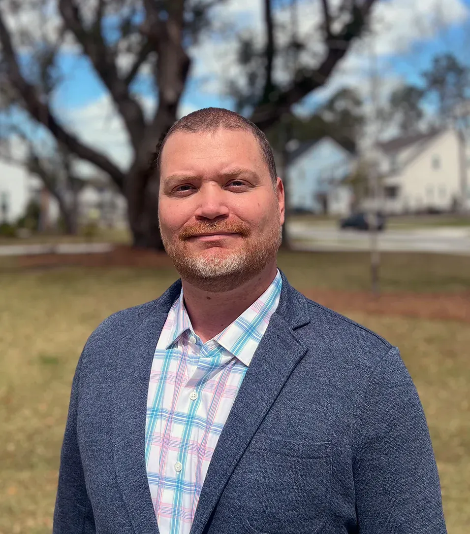Matt Lucas, founder and principal of Palmetto Interactive, wearing a blue blazer